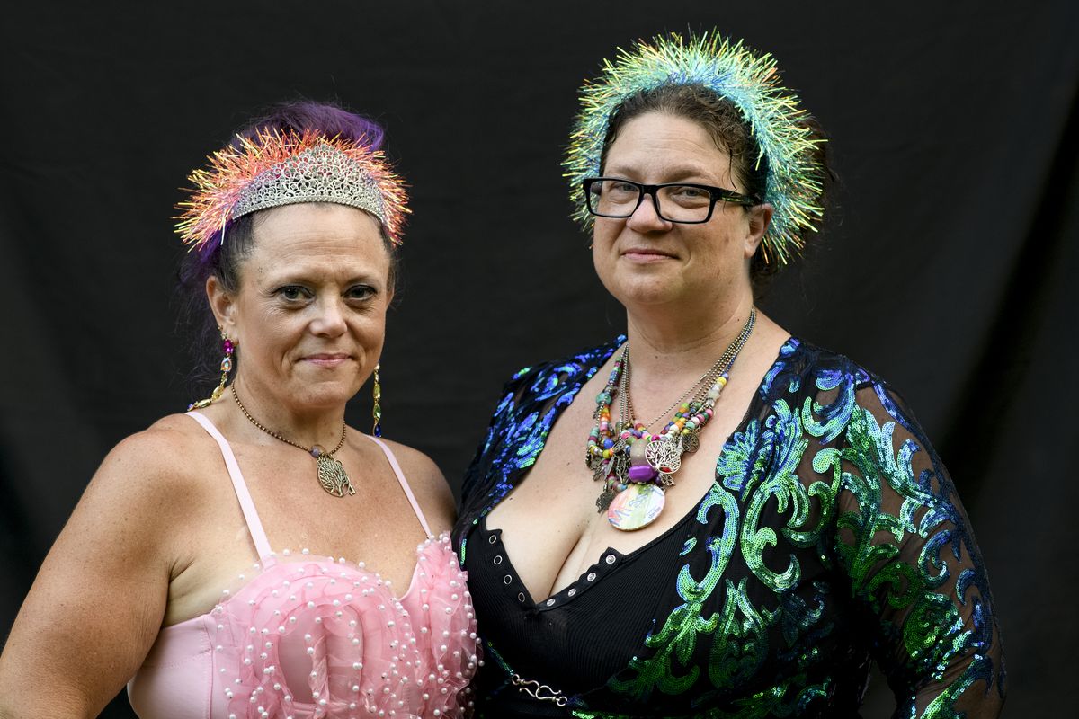 Missy Cooke, 43, of Williamson, Michigan, right, and Coleen DeLacy, 48, of Fort Gratio, Michigan, left, during the 10-year anniversary celebration of the Michigan Hoop Dance Retreat.   (Brittany Greeson/For The Washington Post)