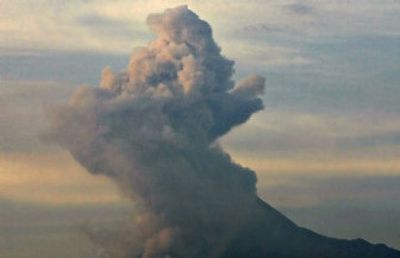 
Indonesia's Merapi volcano erupts early Wednesday. Scientists warned that eruptions still posed a deadly threat to villagers living on its lava-scared slopes, even as volcanic activity eased Tuesday. 
 (Associated Press / The Spokesman-Review)
