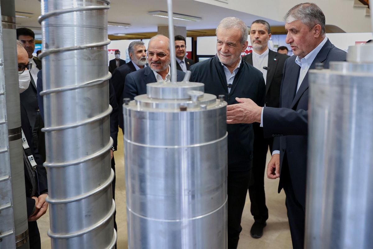 Iran President Masoud Pezeshkian, second from right, on Wednesday at a nuclear industry exhibition in Tehran, Iran.  (AP)