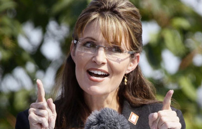 FILE: In this July 26, 2009 file photo, Alaska Gov. Sarah Palin gestures during her resignation speech in Fairbanks, Alaska. Palin is joining Fox News as a contributor. (AP Photo)