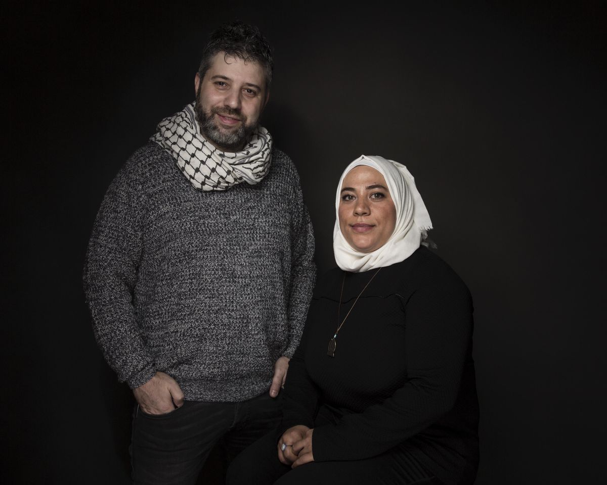 Director Evgeny Afineevsky, left, and Kholoud Helmi, pose for a portrait to promote the film "Cries From Syria" during the Sundance Film Festival in January. The documentary premiers on HBO on Monday. (Taylor Jewell / Invision/AP)