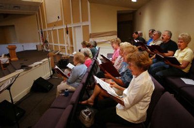 
The Dishman Baptist Church choir holds an evening practice in the new sanctuary. The remodeling project doubled the size of the sanctuary and moved the kitchen to the ground floor.
 (LIZ KISHIMOTO Photos / The Spokesman-Review)