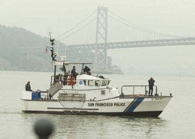 
Members of the San Francisco police marine unit search for the bodies of two children in San Francisco Bay on Thursday. 
 (Associated Press / The Spokesman-Review)