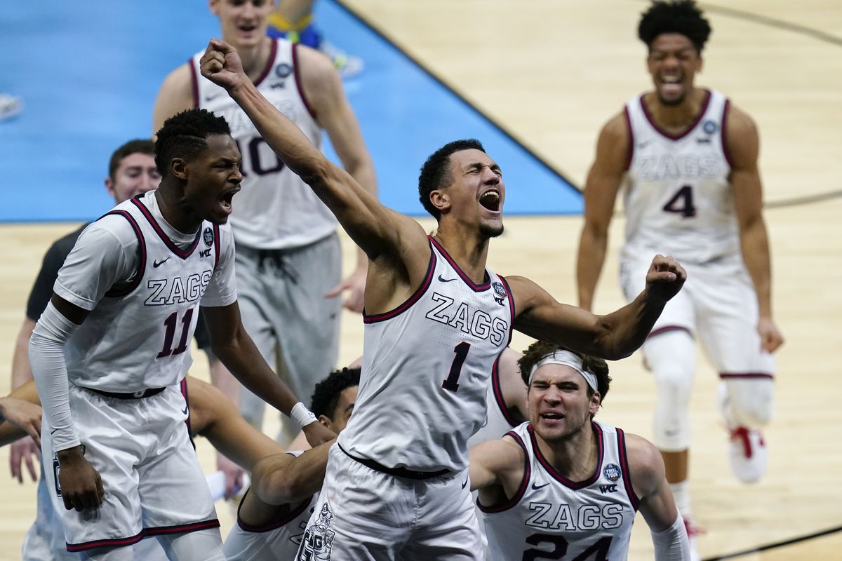 Guard Jalen Suggs (1) and Gonzaga teammates celebrate an overtime win against UCLA at the Final Four that ended with Suggs hitting a 3-pointer at the buzzer.  (Associated Press)
