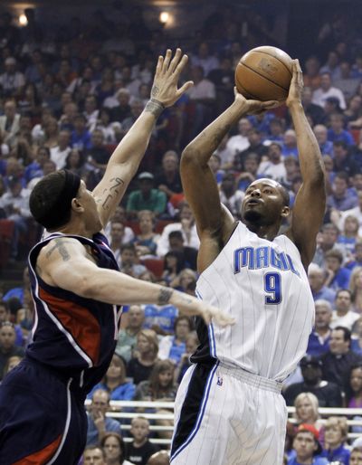 Rashard Lewis scored 20 points in Orlando’s NBA playoff victory over Atlanta.  (Associated Press)
