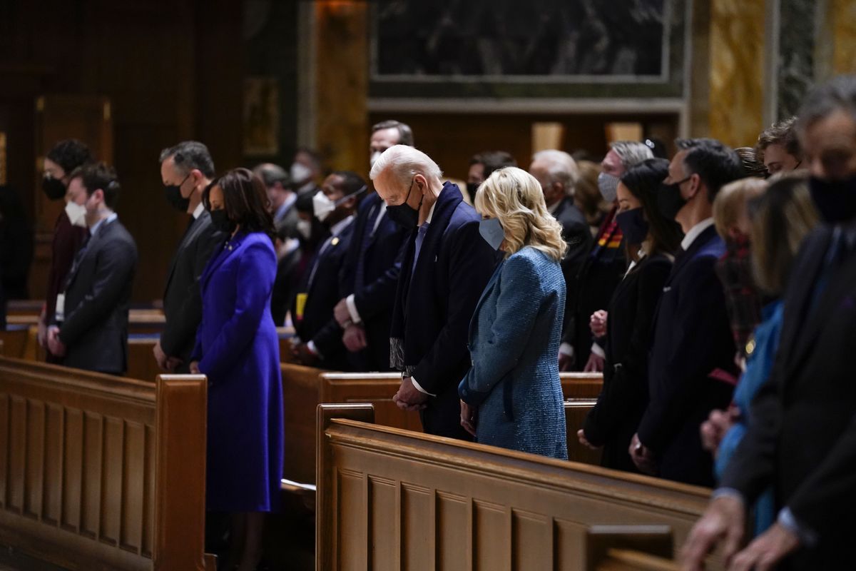 President-elect Joe Biden and his wife Jill Biden attend Mass at the Cathedral of St. Matthew the Apostle during Inauguration Day ceremonies Wednesday, Jan. 20, 2021, in Washington.   (Evan Vucci)