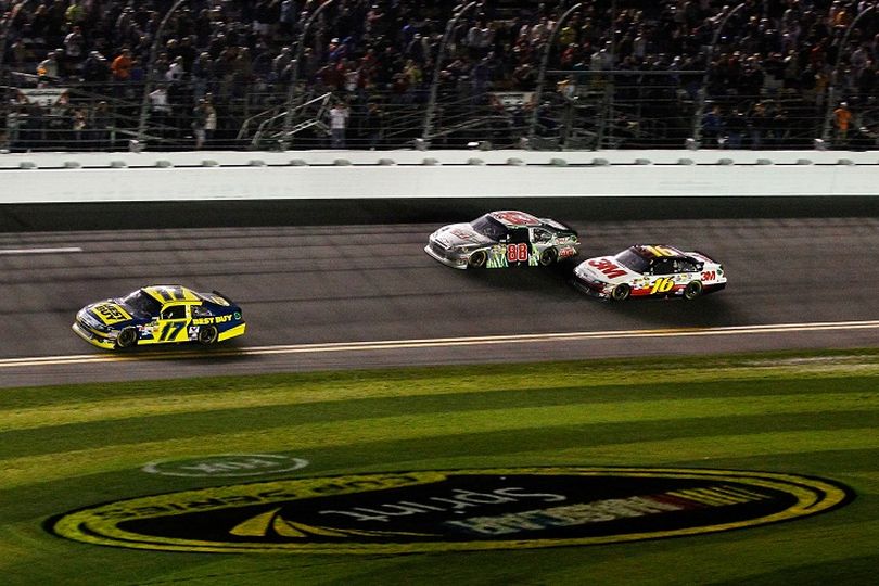 Dale Earnhardt Jr. makes a move to pass Greg Biffle on the final lap of the Daytona 500, but does not have enough speed to catch winner Matt Kenseth. (Photo Credit: Streeter Lecka/Getty Images) (Streeter Lecka / Getty Images North America)