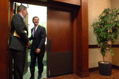 
Dino Rossi steps into the Spokane Falls Ballroom at the Doubletree Hotel in Spokane on Thursday to announce his candidacy for the governorship of Washington. 
 (Jesse Tinsley / The Spokesman-Review)