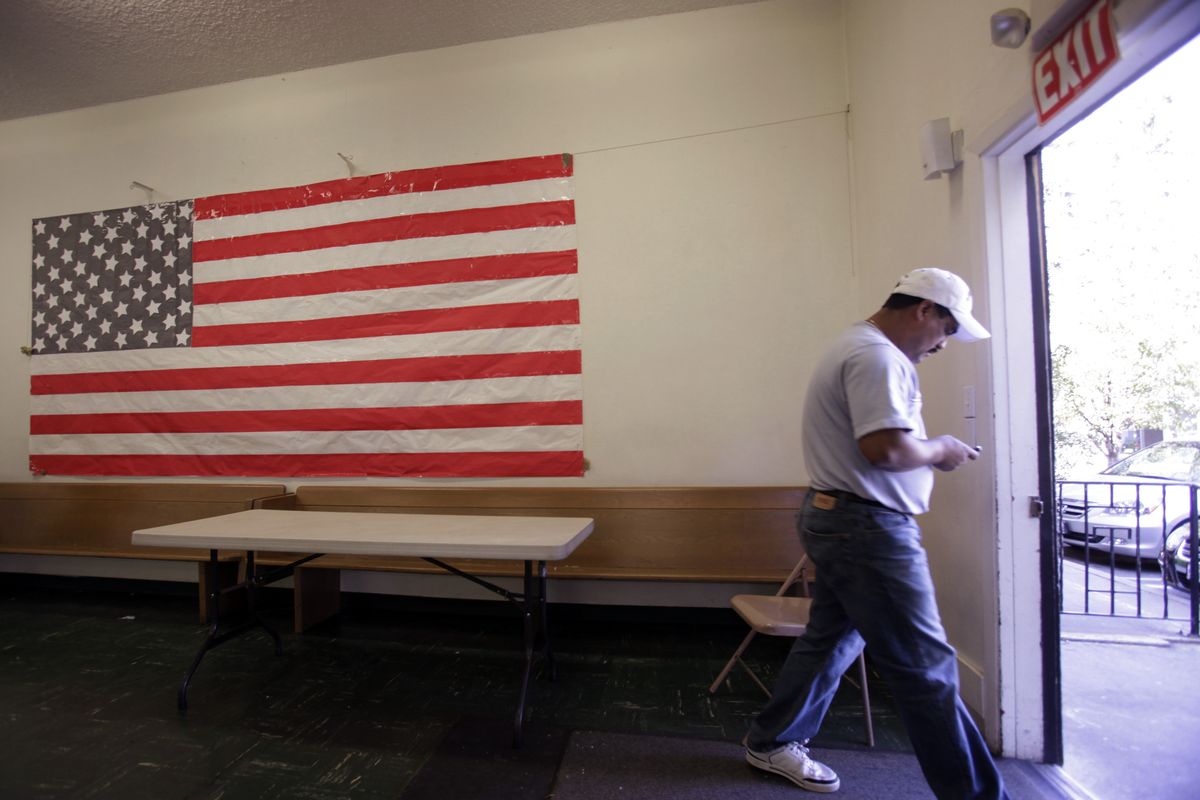 An unemployed worker waits for work at the Day Worker Center of Mountain View, in Mountain View, Calif., on Friday. The nation’s unemployment rate rose to 9.8 percent in September, the highest since June 1983. Associated Press photos (Associated Press photos / The Spokesman-Review)
