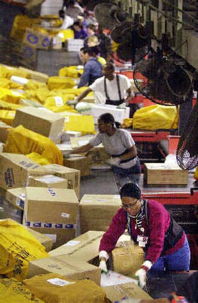 The FedEx Corp. reported a 47 percent increase in fourth quarter earnings Wednesday, citing continued growth in ground deliveries and international express shipments.
(File/Associated Press / The Spokesman-Review)
