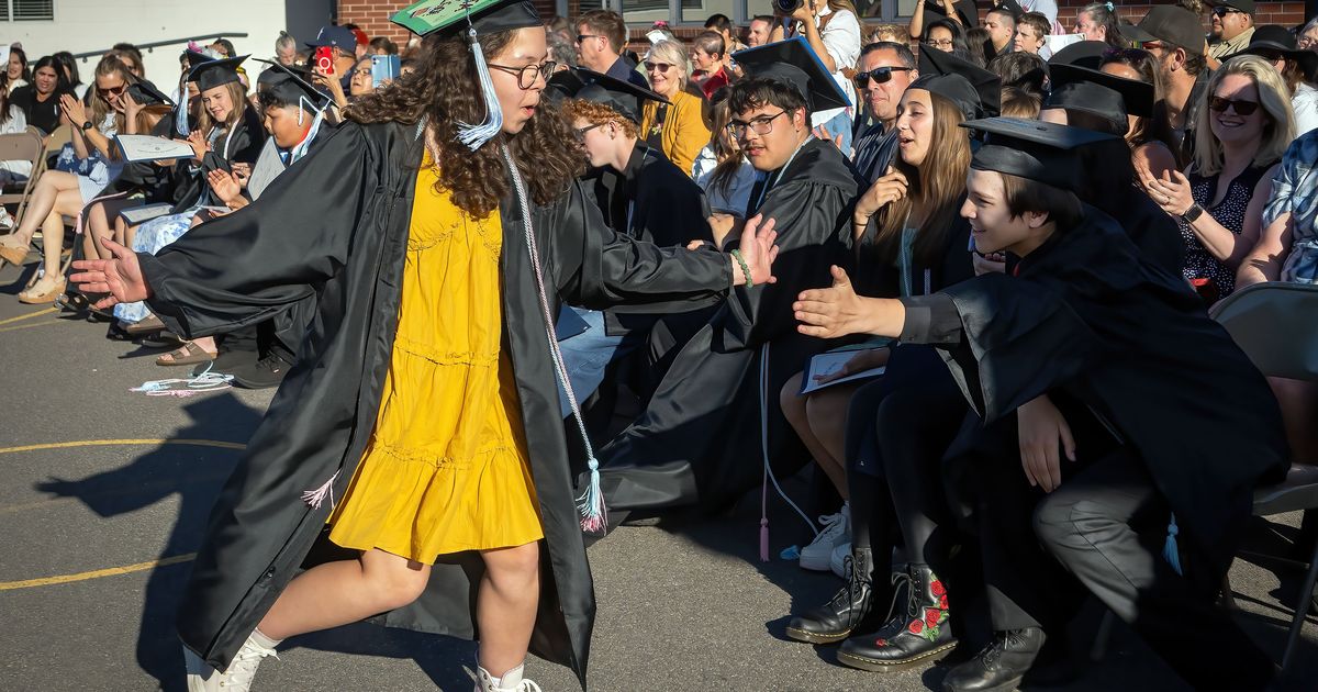 First students to graduate Trejo Dual Language Academy walk stage as speakers of Spanish, English
