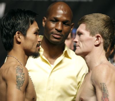 Associated Press Manny Pacquiao, left, and Ricky Hatton face off for a junior welterweight title tonight. (Associated Press / The Spokesman-Review)