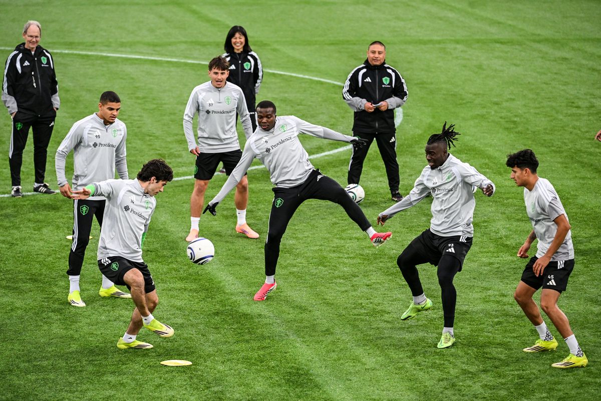 Seattle Sounders participate in a passing drill called rondos during practice Tuesday at One Spokane Stadium. The Sounders will play against the Vancouver Whitecaps at 8 p.m. Wednesday at ONE Spokane Stadium.  (DAN PELLE/FOR THESPOKESMN-REVIEW)