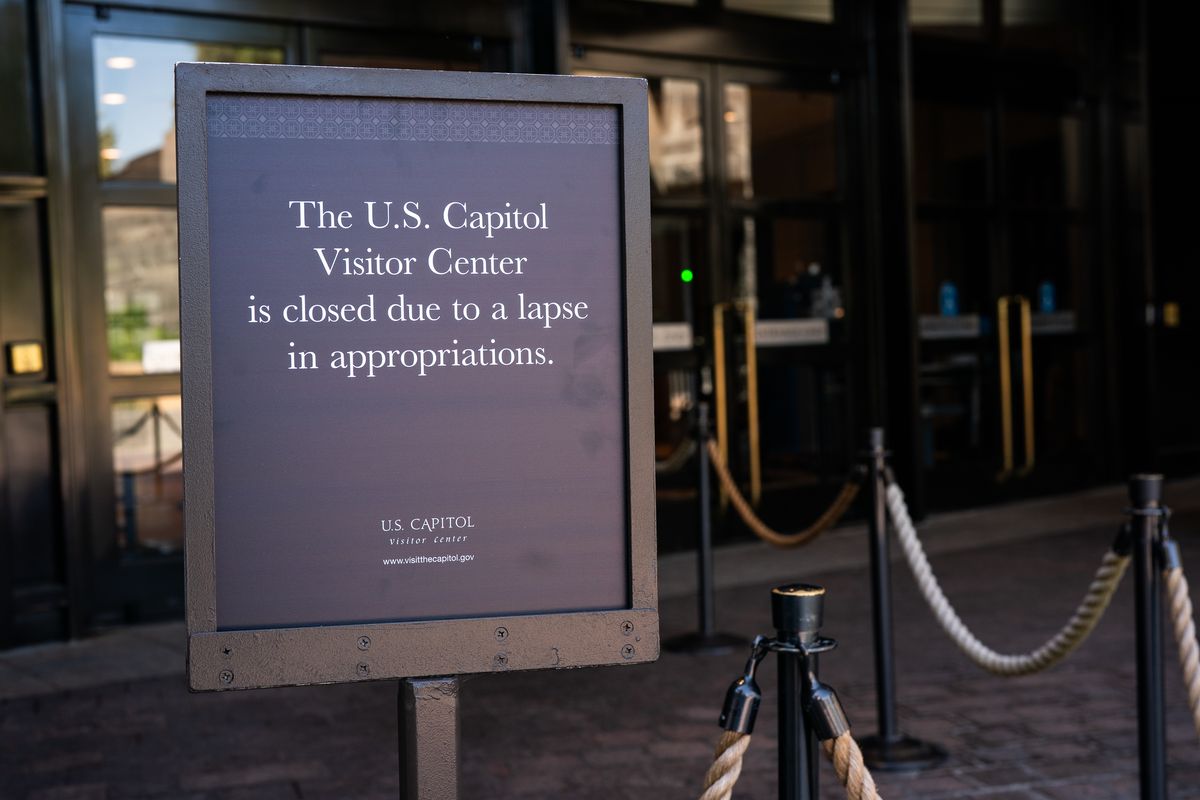 A sign outside the U.S. Capitol advises visitors about the government shutdown on Wednesday.   (Demetrius Freeman/The Washington Post)