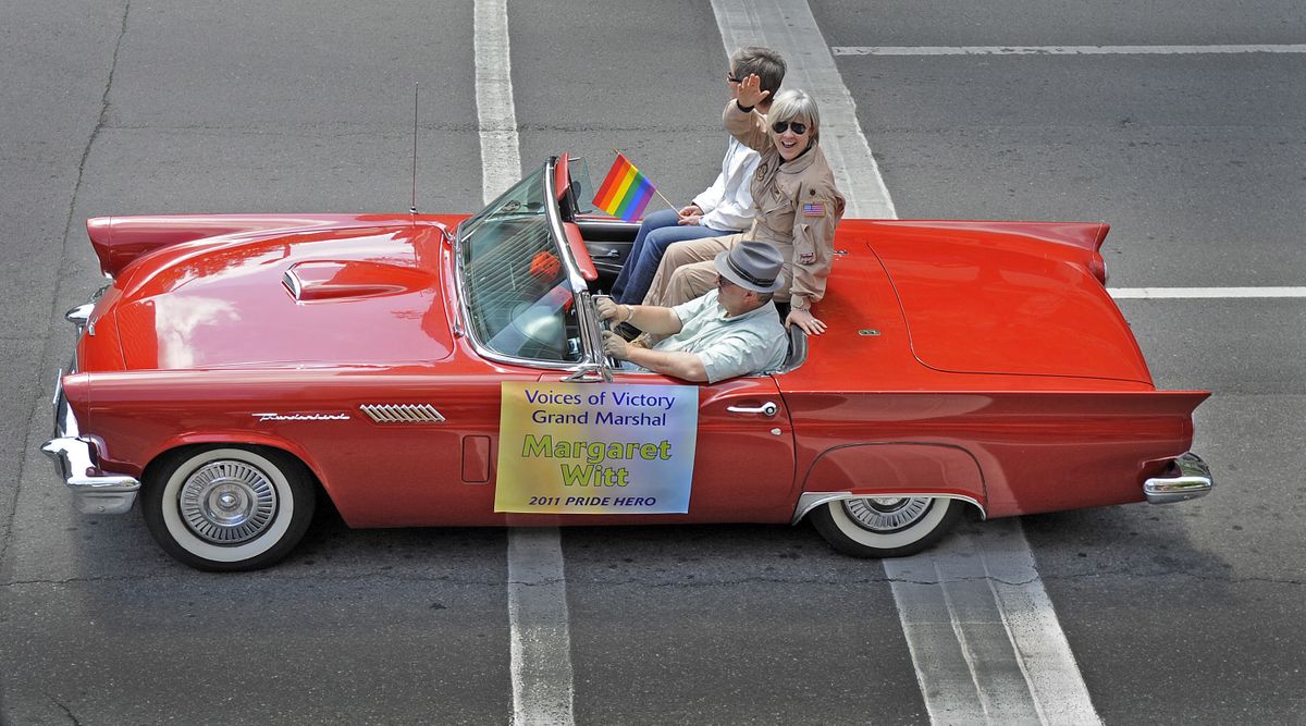 Grand Marshal Maj. Margaret Witt rides in the Spokane Pride Parade on Saturday. Discharged from the Air Force, Witt settled a lawsuit against the Pentagon. (Christopher Anderson)
