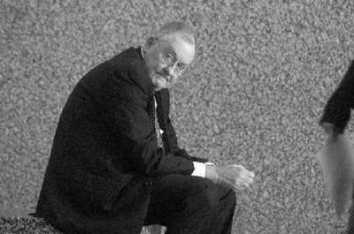 
Former Illinois Gov. and former Hollinger board member James R. Thompson sits outside the Federal Building before testifying Tuesday in Chicago. 
 (Associated Press / The Spokesman-Review)