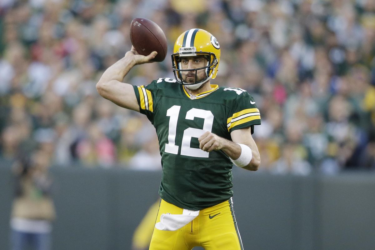 In this photo taken Nov. 6, 2016, Green Bay Packers’ Aaron Rodgers throws during the first half of an NFL football game against the Indianapolis Colts Sunday, in Green Bay, Wis. (Jeffrey Phelps / Associated Press)