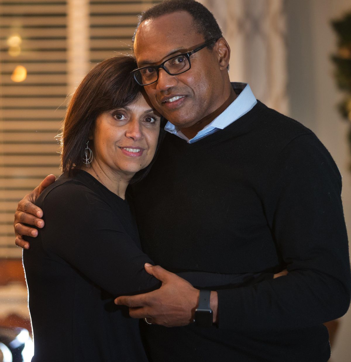 Ana and Curt Warner at their Camas area home in December 2018. Former Seahawks running back Curt Warner and his wife, Ana, have four children including severely autistic twin sons. They have written a book titled, "The Warner Boys" about their family and struggles. Photographed on December 4, 2018. (Mike Siegel / The Seattle Times)