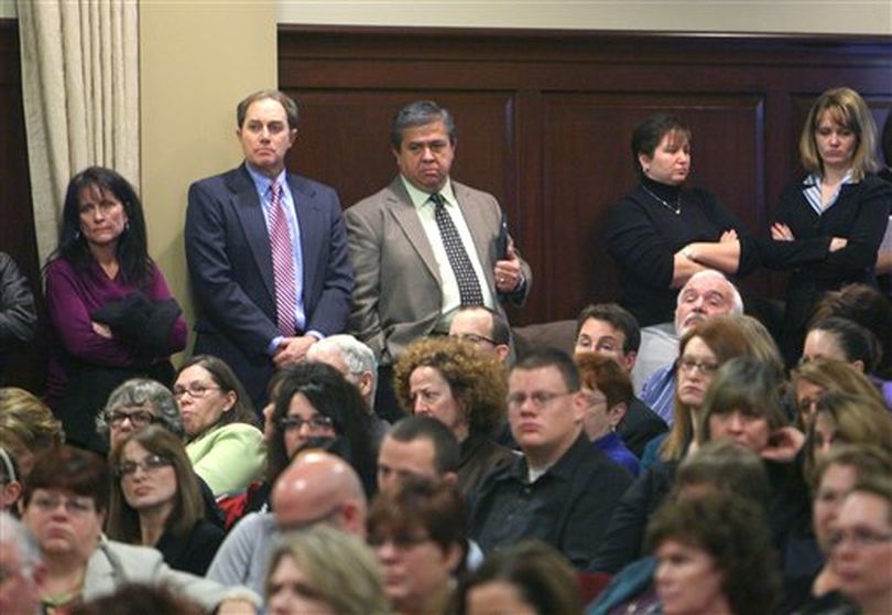 Superintendent of Public Schools Tom Luna, center, listens to testimony on Friday Jan 21, 2011 before the Joint Finance-Appropriations Committee at the Idaho Statehouse in Boise. Luna has proposed sweeping changes to Idaho's schools. (Chris Butler / AP Photo/Idaho Statesman)