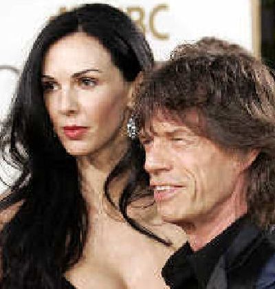 
 L'Wren Scott, Mick Jagger
 (The Spokesman-Review)