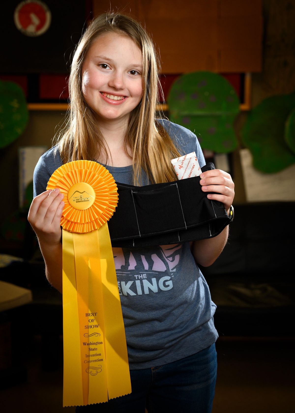Aevery McMullin, of North Wall Middle School, won Best of Show in the grade 5-6 group in the health category for her invention, Cramp Comfort, a rechargeable belt that can be worn to soothe lower back or  cramps discomfort. (Colin Mulvany / The Spokesman-Review)