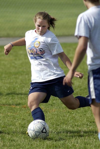 
U-Hi junior Abby Goss maneuvers the ball during practice.
 (The Spokesman-Review)