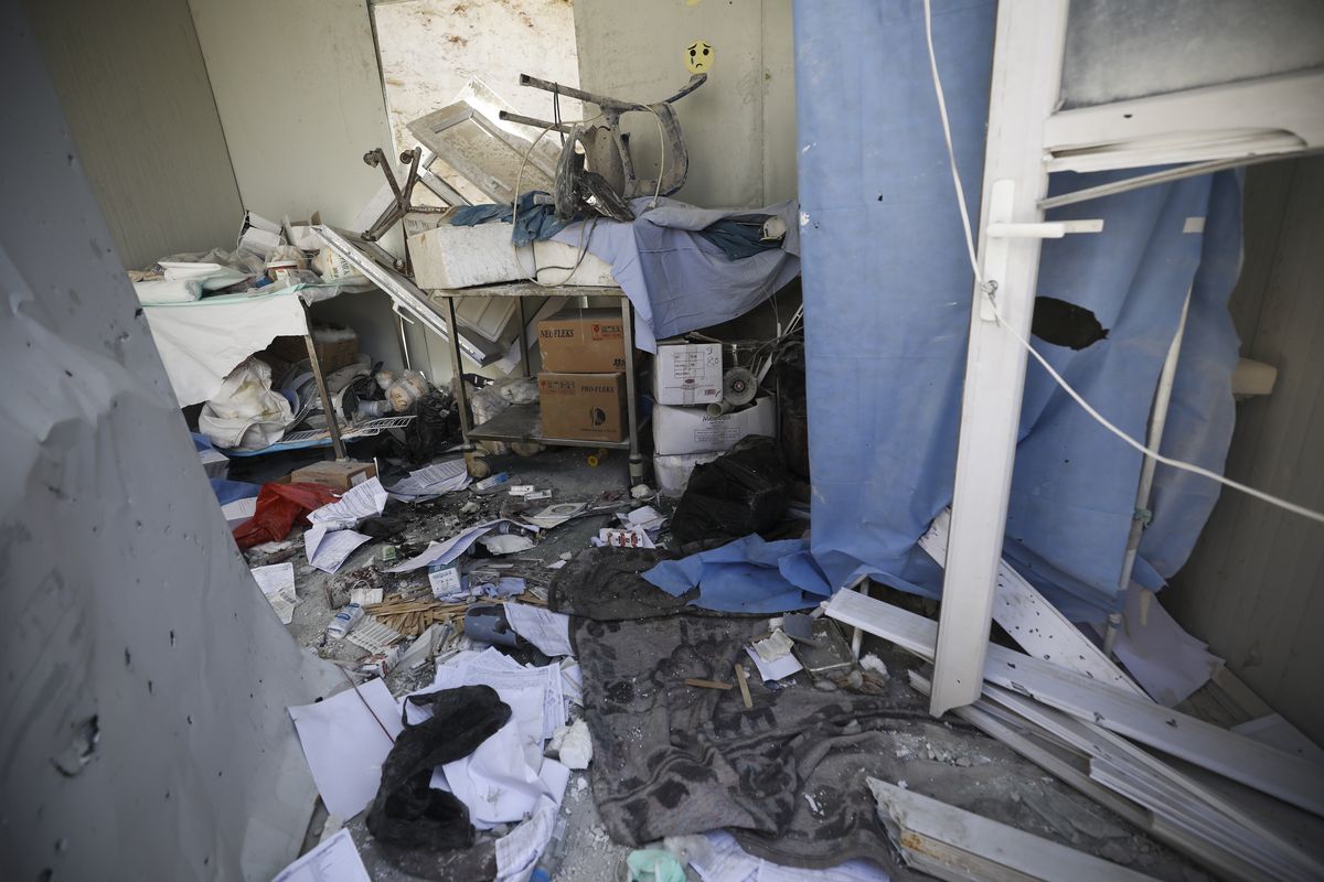 Damage from shelling is seen in hospital in Atareb, a town in rural western Aleppo, Syria, Sunday, March 22, 2021. Artillery shells fired from government areas killed at least five civilians and wounded medical staff when they landad in front of the hospital. (Ghaith Alsayed)