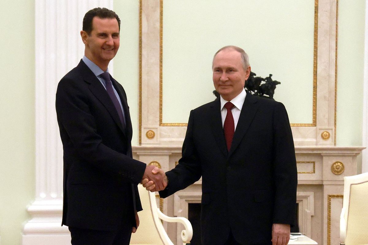 Russian President Vladimir Putin meets with his Syrian counterpart Bashar al-Assad at the Kremlin in Moscow on March 15, 2023.    (Vladimir Gerdo/Sputnik/AFP/Getty Images North America/TNS)