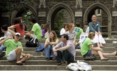 Potential students and their parents eat lunch and talk following a tour of the campus at Duke University in Durham, N.C.  (File Associated Press / The Spokesman-Review)