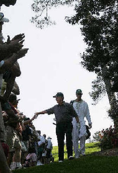 
Jack Nicklaus greets well-wishers as he walks to the sixth green during Tuesday's practice at Augusta National. 
 (Associated Press / The Spokesman-Review)