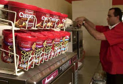 
A display of Campbell's Soup sits atop a microwave oven at a 7-Eleven store in Hackensack, N.J., earlier this week. The effort to sell in places other than grocery stores is one of the innovations that Campbell Soup Co., has made since it launched a plan three years ago to transform the company from one that its CEO says was in disarray. 
 (Associated Press / The Spokesman-Review)