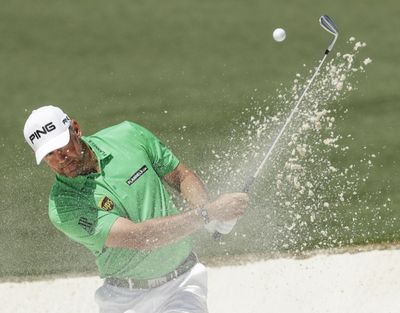 Lee Westwood, of England, hits from a bunker on the second hole during the final round of the Masters golf tournament Sunday, April 9, 2017, in Augusta, Ga. (Matt Slocum / Associated Press)