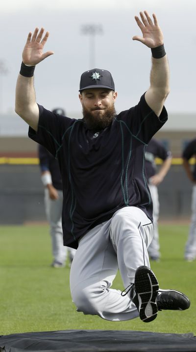 Seattle LF Dustin Ackley’s wife gave birth on way to spring training. (Associated Press)