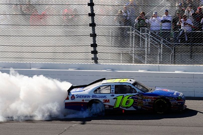 Greg Biffle, who was one of the race’s 12 leaders after claiming the P1 spot three times for 60 laps, performs a burnout after winning the NASCAR Sprint Cup Series Price Chopper 400 on Sunday in Kansas City, Kan. (Photo courtesy of Rusty Jarrett/Getty Images) (Rusty Jarrett / Getty Images North America)