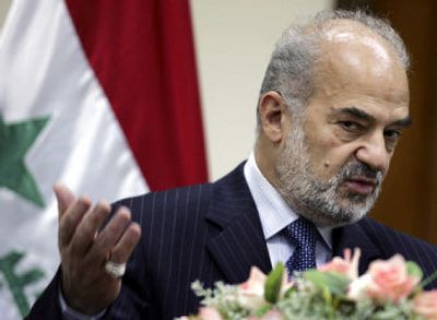 
Iraqi interim Prime Minister Ibrahim al-Jaafari speaks to reporters on Wednesday, saying he won't step down. 
 (Associated Press / The Spokesman-Review)