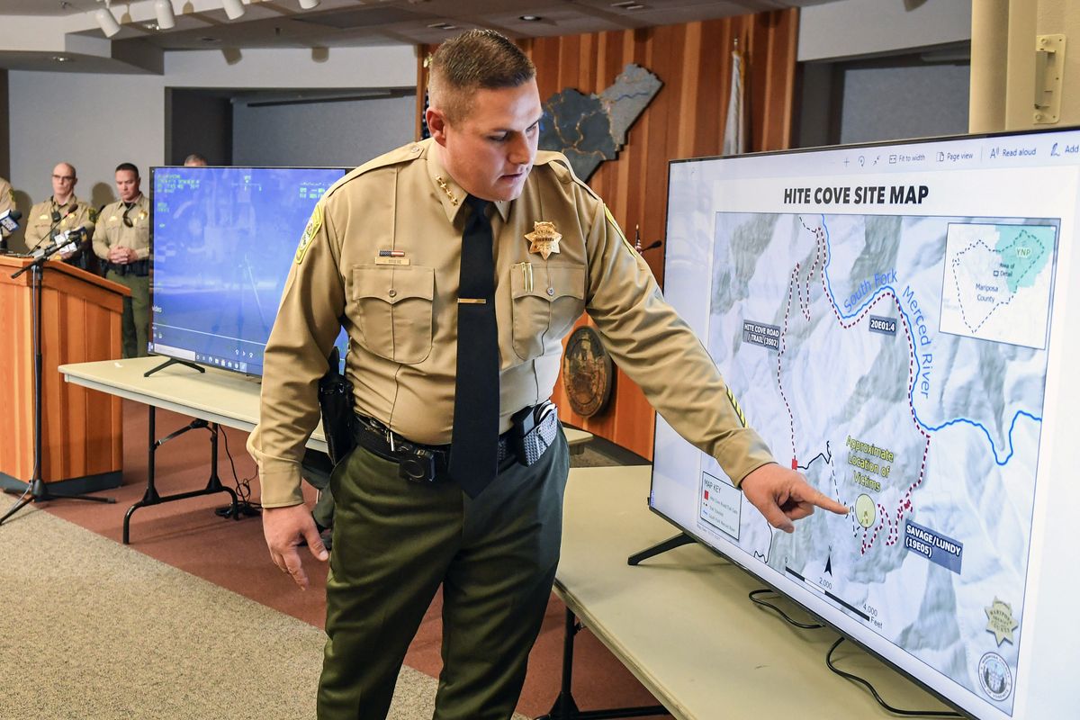 Mariposa County Sheriff Jeremy Briese points to a map Thursday to show where a missing family was found dead during a press conference in Mariposa, Calif. (Craig Kohlruss)