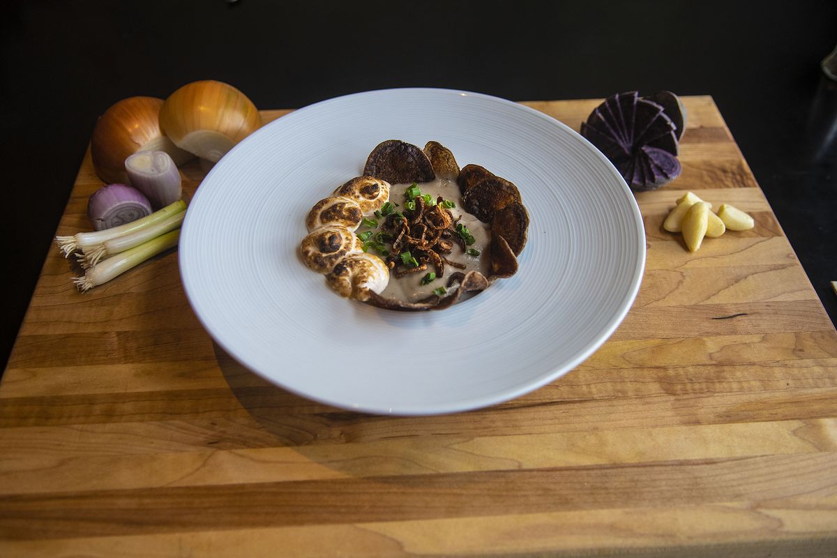 Roasted purple potato soup is served at Honey Eatery in Coeur d’Alene on Tuesday, Nov. 10, 2020.  (Kathy Plonka/The Spokesman-Review)