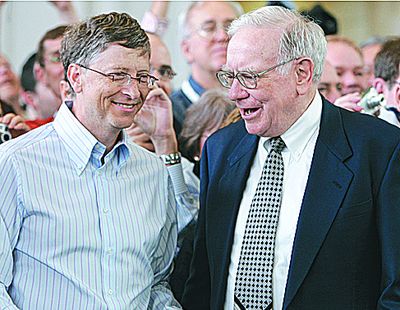 FILE - In this May 6, 2007 file photo, Microsoft co-founder Bill Gates, left, and billionaire investor Warren Buffett are seen during the annual Berkshire Hathaway shareholders meeting in Omaha, Neb. Gates and Buffett are launching a campaign to get other American billionaires to give at least half their wealth to charity. (Associated Press / Associated Press)
