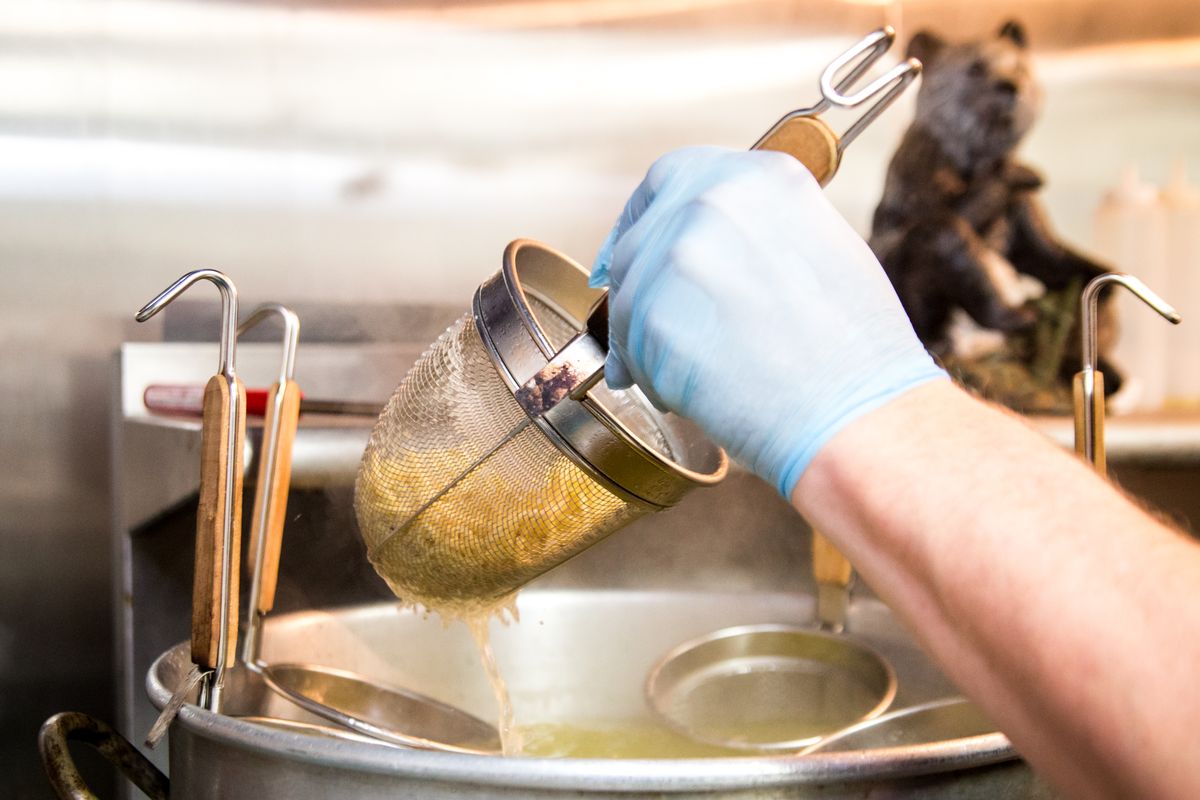 The soba noodle station, manned by Justin Kropff, is seen during the 31st annual Ramen Fest, hosted by the Spokane Buddhist Temple in Spokane