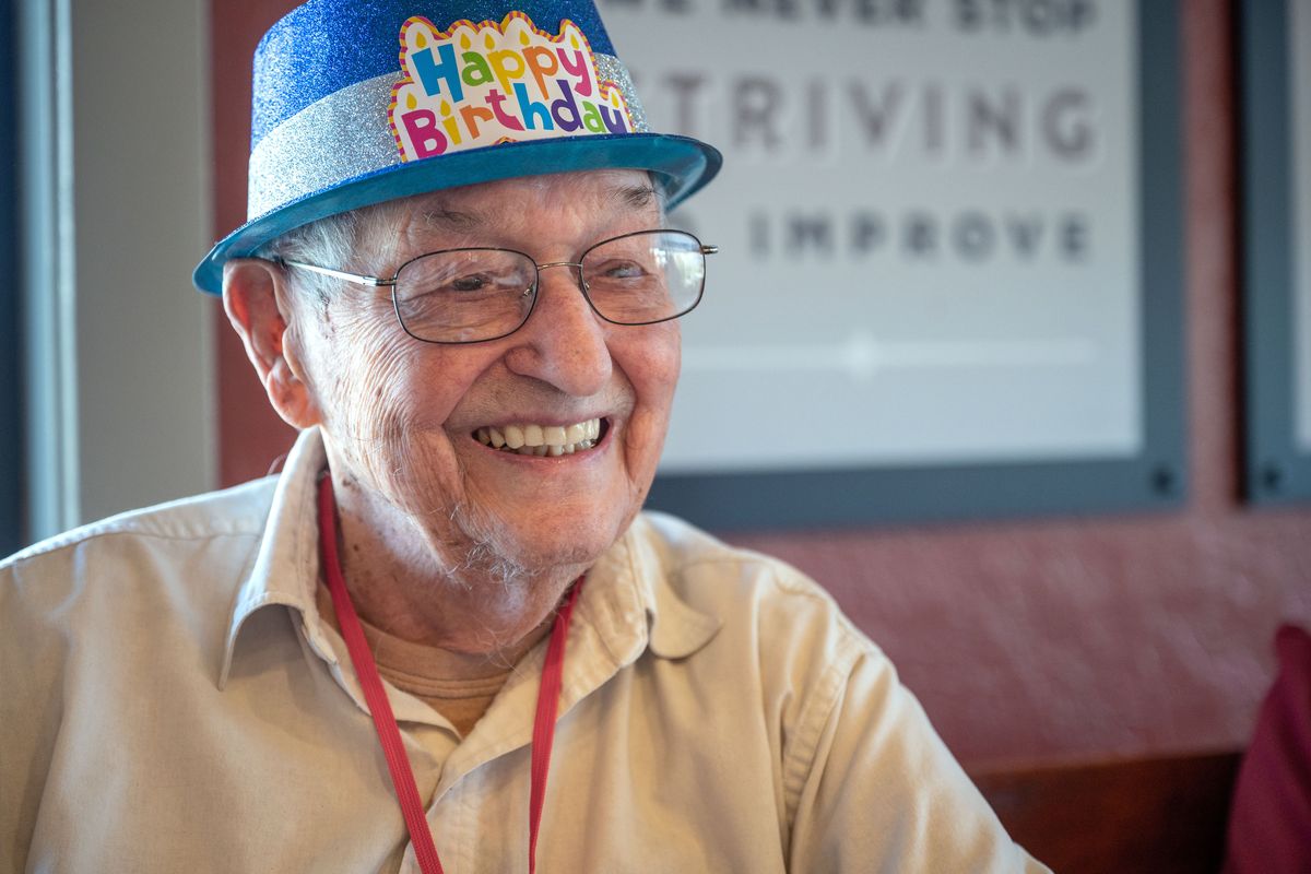 Bert Jones’ actual 100th birthday is July 18, but the members of the local AARP group don’t meet in July and decided to surprise him at their June meeting at the Golden Corral restaurant on June 23. Jones served in the Army during WWII and the Korean War.  (COLIN MULVANY/THE SPOKESMAN-REVI)