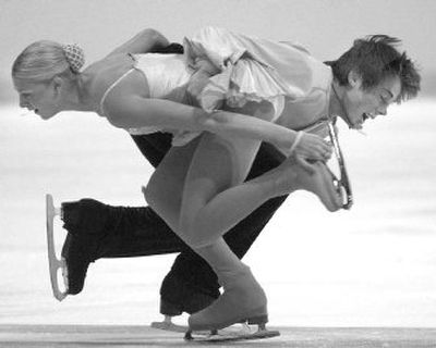 
Bianca Butler and Joseph Jacobsen intertwine Tuesday during their junior pairs short program at the U.S. Figure Skating Championships. Butler and Jacobsen are in second place heading into Thursday's free skate.   
 (Brian Plonka / The Spokesman-Review)