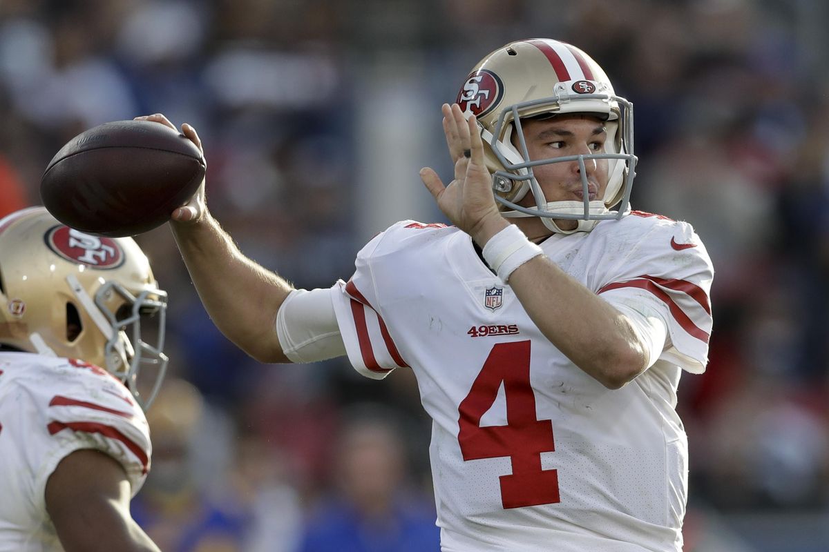 San Francisco 49ers quarterback Nick Mullens passes against the Los Angeles Rams during the second half  Dec. 30  in Los Angeles. (Marcio Jose Sanchez / AP)