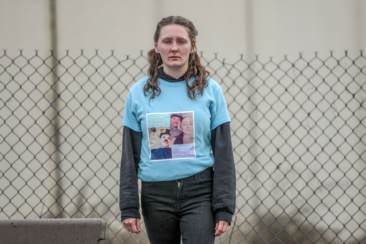 Katelynn McConnell is photographed wearing a t-shirt in memory of her boyfriend in Spokane on Friday, Feb. 17, 2023. She was the victim of a shooting in December last year that killed her boyfriend, Tavius J. Fry Cooley. The two were at their apartment and were celebrating his birthday before the shooting. The shooter has not been arrested yet.  (Kathy Plonka/The Spokesman-Review)