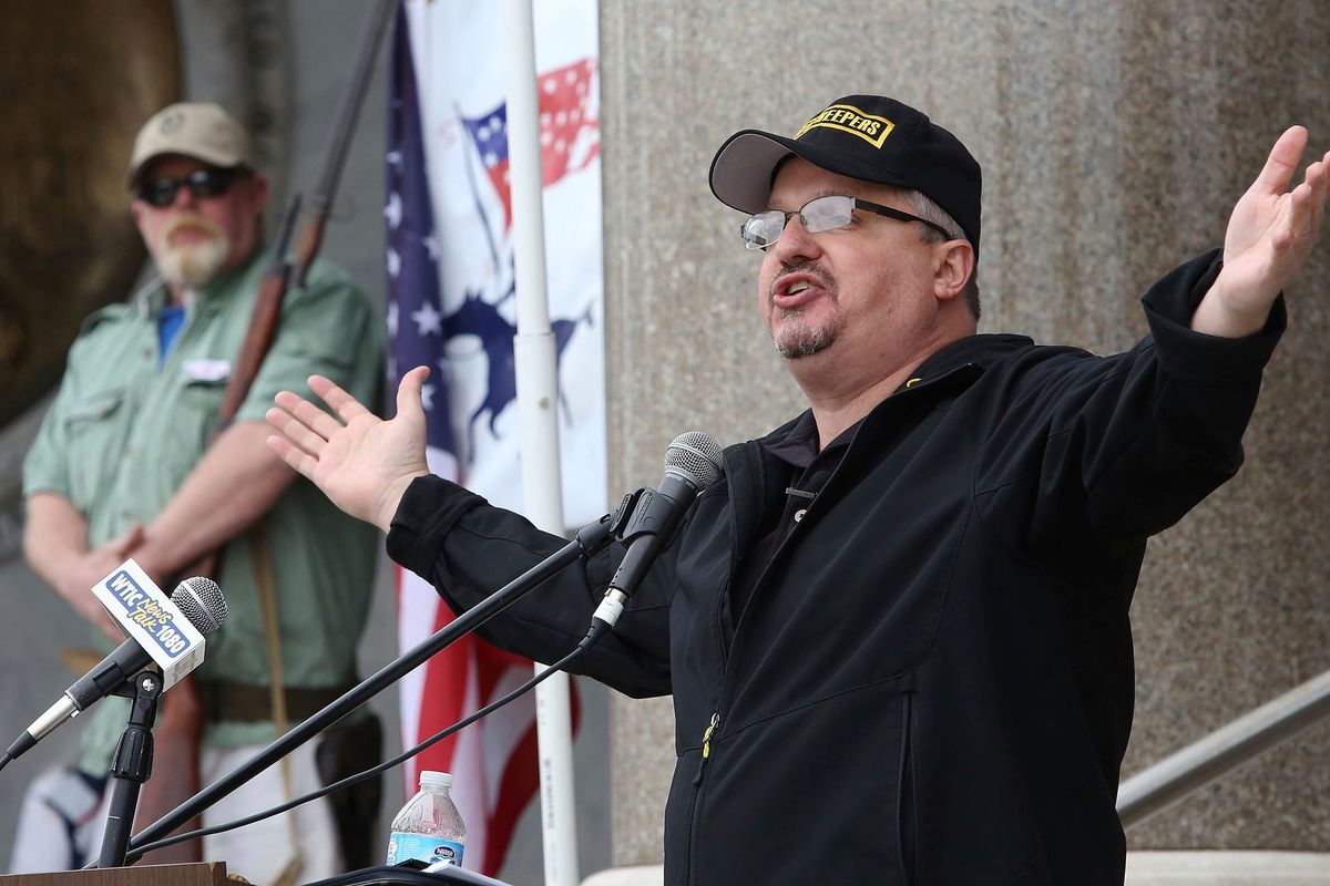 FILE - Stewart Rhodes, founder of Oath Keepers, speaks during a gun rights rally at the Connecticut State Capitol in Hartford, Conn., Saturday April 20, 2013. Rhodes has been arrested and charged with seditious conspiracy in the Jan. 6 attack on the U.S. Capitol. The Justice Department announced the charges against Rhodes on Thursday. MANDATORY CREDIT  (Jared Ramsdell)
