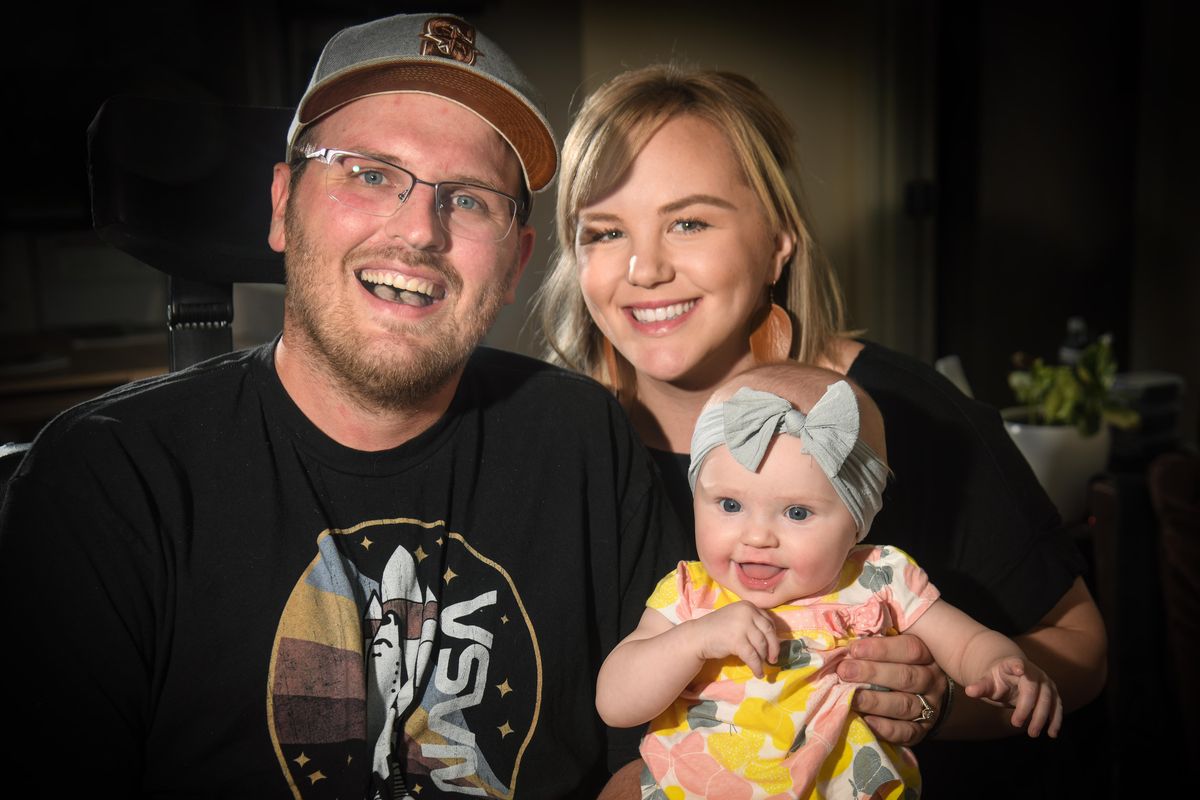 Dan and Ashley Marlow decided to have their daughter, Remi, age 6 months, despite Dan’s battle with ALS. (Dan Pelle / The Spokesman-Review)