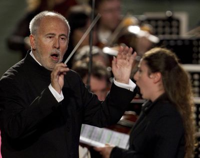 Director Jesus Lopez Cobos directs the orchestra and choir of Rome's Opera theatre during a concert May 5, 2011 in the Pope Paul VI hall at the Vatican. (Andrew Medichini / Associated Press)