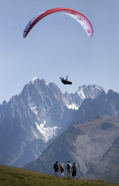 In this photo provided by Red Bull race leader Christian Maurer of Switzerland flies past the Mont Blanc turnpoint on day 9 of the Red Bull X-Alps adventure race from Salzburg to Monaco in Haute-Savoie, France, Monday July 27, 2009. The Spokane-area paragliding group, Center of Lift, is hosting an athlete fresh from competing in the Red Bull X-Alps paragliding race. (Dean Treml / AP)