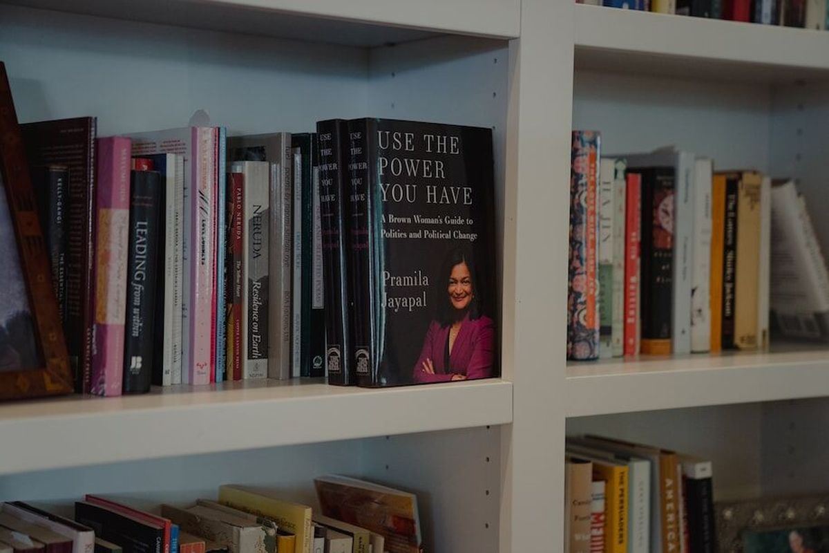 Copies of Rep. Pramila Jayapal’s book, “Use the Power You Have,” sit on her shelf. (Jovelle Tamayo/For the Washington Post)