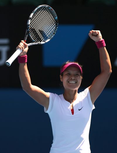 Li Na of China celebrates after defeating Eugenie Bouchard of Canada to reach Australian Open final. (Associated Press)