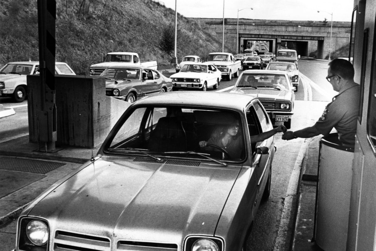 1979: Motorists line up to pay tolls on the Maple Street Bridge, which opened in 1958 and was paid for with bonds that would be repaid with toll revenue. The new bridge helped relieve traffic density on the Monroe Street and Division Street bridges, though a number of motorists still used other routes to avoid the tolls, which started at 10 cents and rose to 25 cents in 1981. (Spokesman-Review photo archives)